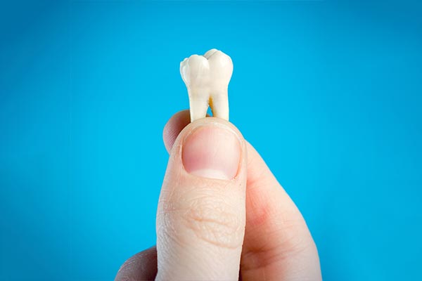 A General Dentist Helps You Decide Whether To Pull or Save a Tooth from Vital Dental of Bayside in Bayside, NY